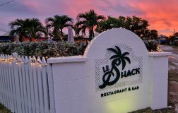 Entrance to Le Shack Restaurant and Bar at sunset in Barbados.